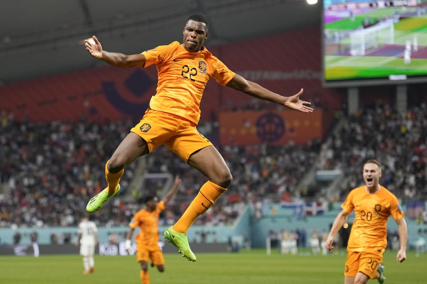 Denzel Dumfries of the Netherlands celebrates scoring his side&#039;s 3rd goal during the World Cup round of 16 soccer match between the Netherlands and the United States, at the Khalifa International ...