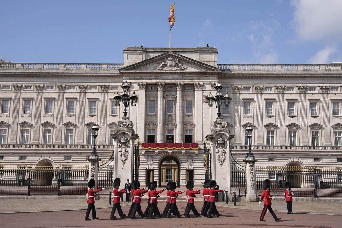 Members of the Foot Guards march outside Buckingham Palace ahead of Trooping the Colour ceremony, the king&#039;s annual birthday parade, in London, Saturday, June 14, 2025. (Aaron Chown/PA via AP)
