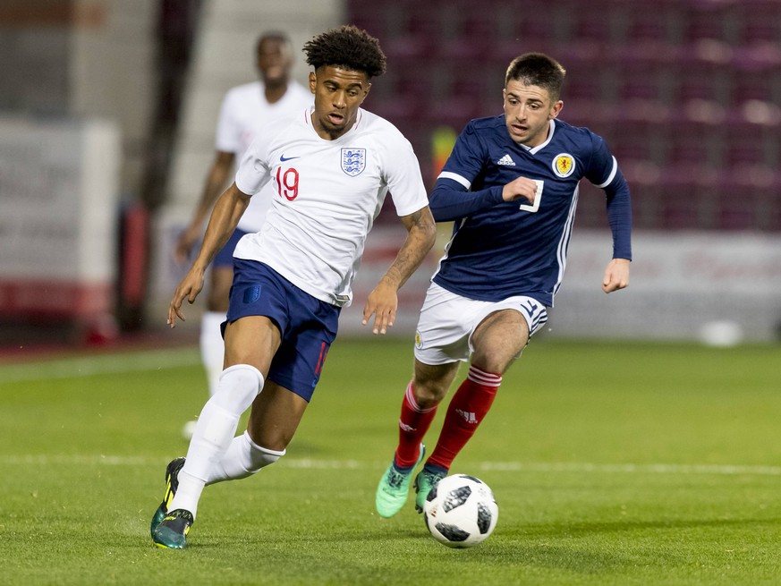 16th October 2018, Tynecastle Park, Edinburgh, Scotland; UEFA U21 U 21 European Football Championships, qualification, Scotland versus England; Reiss Nelson of England takes on Greg Taylor of Scotland ...