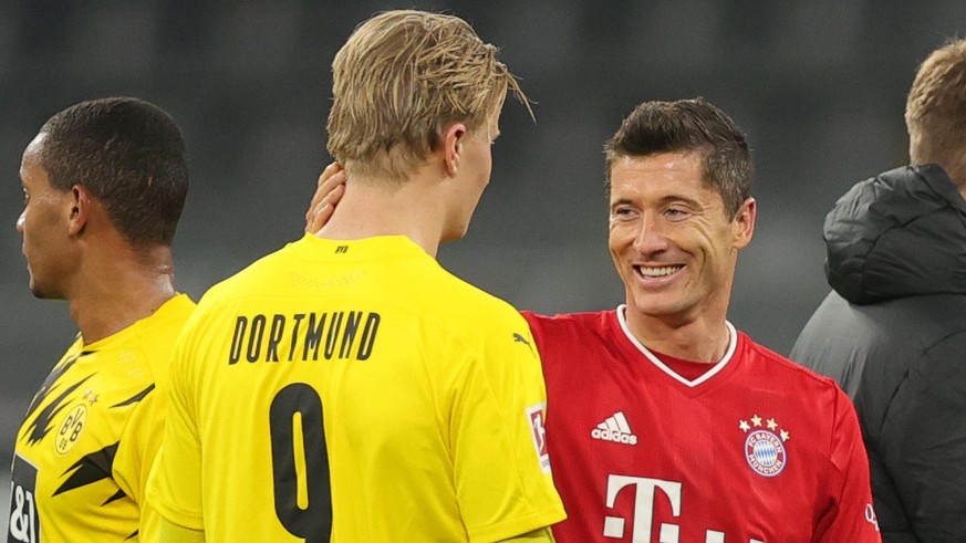 DORTMUND, GERMANY - NOVEMBER 07: Erling Haaland of Dortmund and Robert Lewandowski of Muenchen chat after the Bundesliga match between Borussia Dortmund and FC Bayern Muenchen at Signal Iduna Park on  ...