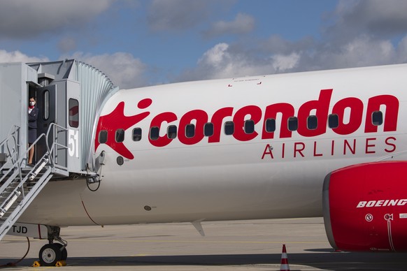 FILE - Senior cabin crew member Magdalini Michailidou stands on the gangway prior the first holiday flight of the Corendon Airlines Europe to the Greek destination Rhodos at the airport Erfurt-Weimar  ...