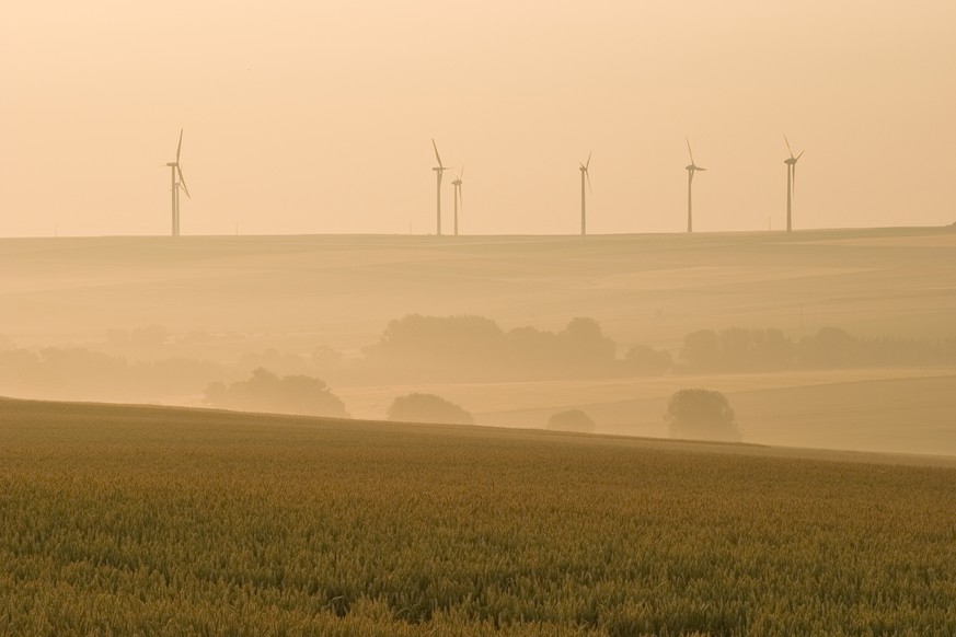 &quot;Morning shot in the rural Palatinate, Germany, taken during the heatwave in summer 2006. The download in AdobeRGB looks more impressive. No motion blur in the wind turbines.&quot;