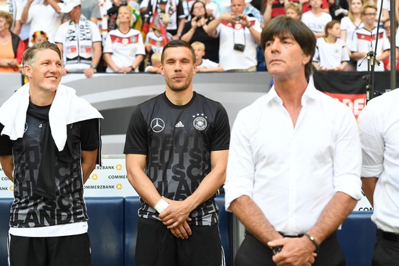 Germany&#039;s Bastian Schweinsteiger (L-R), Lukas Podolski and head coach Joachim Loew seen prior to the international soccer friendly match between Germany and Hungary at the Veltins Arena in Gelsen ...