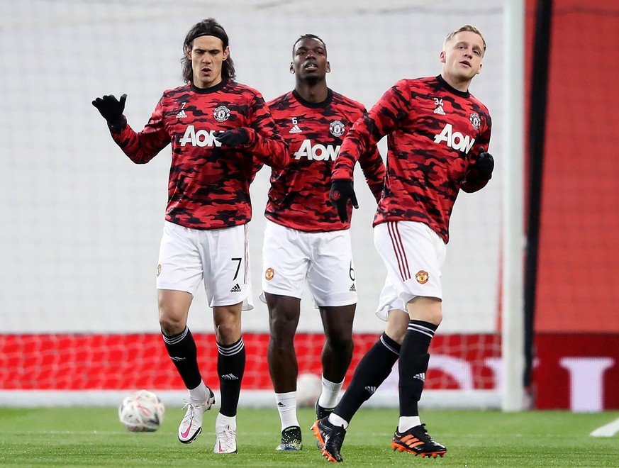 Edinson Cavani, Paul Pogba and Donny van de Beek file photo File photo dated 24-01-2021 of left to right Manchester United, ManU s Edinson Cavani, Paul Pogba and Donny van de Beek. Issue date: Wednesd ...