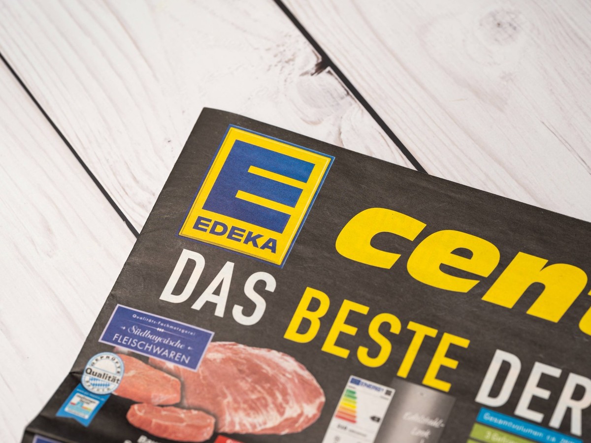 Augsburg, Bavaria, Germany - 2 April 2023: An EDEKA brochure with the offers of the week *** Ein EDEKA Prospekt mit den Angeboten der Woche
