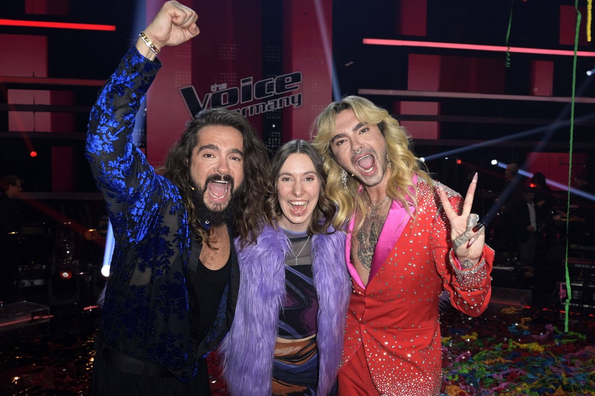 Tom Kaulitz, Malou Lovis Kreyelkamp und Bill Kaulitz im Finale der 13. Staffel der Castingshow The Voice of Germany 2023 im Studio H Berlin Adlershof. Berlin, 08.12.2023 *** Tom Kaulitz, Malou Lovis K ...