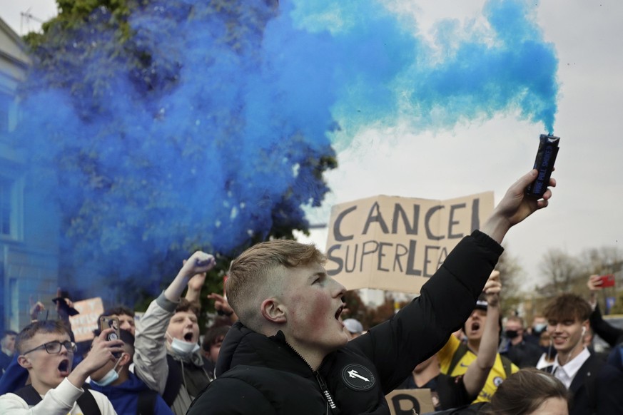 Chelsea fans protest outside Stamford Bridge stadium in London, against Chelsea's decision to be included amongst the clubs attempting to form a new European Super League, Tuesday, April 20, 2021. Rea ...