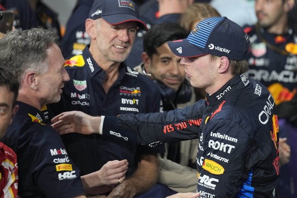Red Bull driver Max Verstappen of the Netherlands celebrates with Red Bull team principal Christian Horner after winning the Formula One Saudi Arabian Grand Prix at the Jeddah Corniche Circuit, in Jed ...