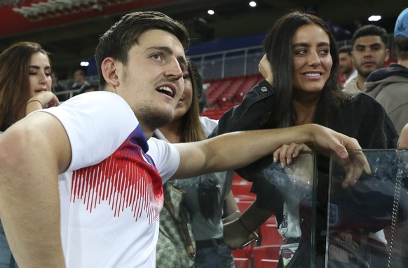 MOSCOW, RUSSIA - JULY 3: Harry Maguire of England and his girlfriend Fern Hawkins following the 2018 FIFA World Cup Russia Round of 16 match between Colombia and England at Spartak Stadium on July 3,  ...