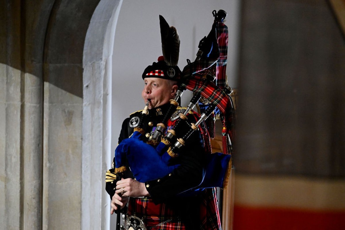 LONDON, ENGLAND - SEPTEMBER 19: Pipe Major Paul Burns of the Royal Regiment of Scotland helps to close Queen Elizabeth II state funeral with a rendition of the traditional piece Sleep, Dearie, Sleep a ...