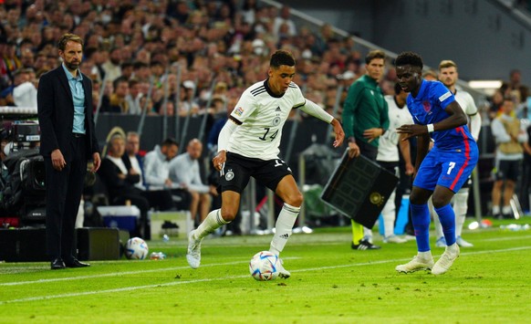 Mandatory Credit: Photo by Javier Garcia/Shutterstock 12975315cc England manager Gareth Southgate looks on as Jamal Musiala of Germany takes on Bukayo Saka Germany v England, UEFA Nations League, Grou ...