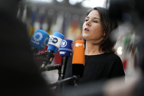 Germany&#039;s Foreign Minister Annalena Baerbock speaks with the media as she arrives for a meeting of EU foreign ministers at the European Council building in Brussels on Monday, March 20, 2023. Eur ...