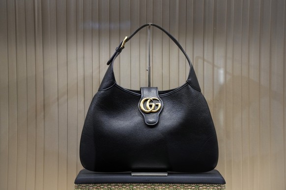 File - A handbag is displayed in the window of a Gucci store in Pittsburgh on Monday, Jan. 30, 2023. On Friday, the Commerce Department issues its February report on consumer spending. (AP Photo/Gene  ...
