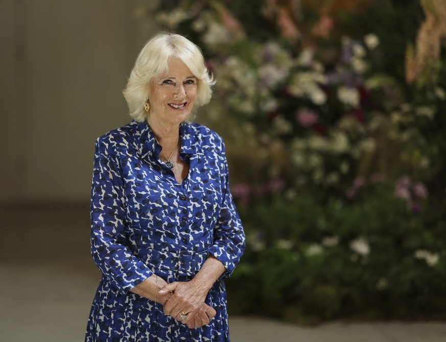 Britain&#039;s Queen Camilla during a visit to the Garden Museum in Lambeth, London, to open the annual British Flowers Week Exhibition, Thursday June 8, 2023. (Geoff Pugh, Pool via AP)