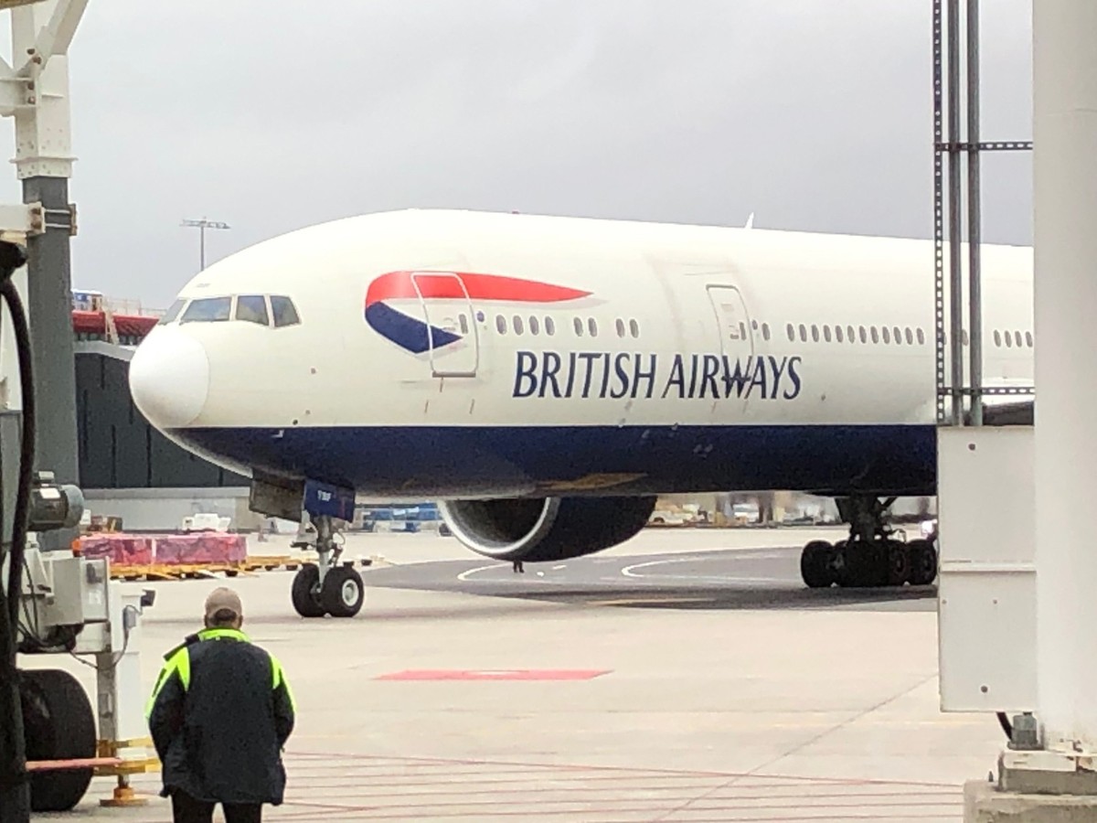 British Airways plane carrying Britain's Prince William and Catherine, Princess of Wales, arrives at Boston Logan International Airport on Wednesday, Nov. 30, 2022. The Prince and Princess of Wal ...