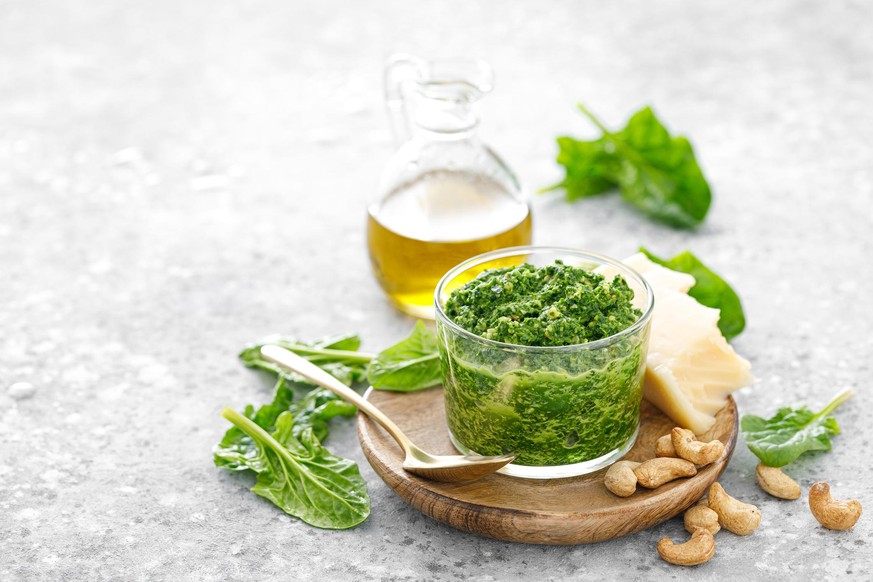 Spinach pesto sauce with cashew, parmesan cheese and olive oil