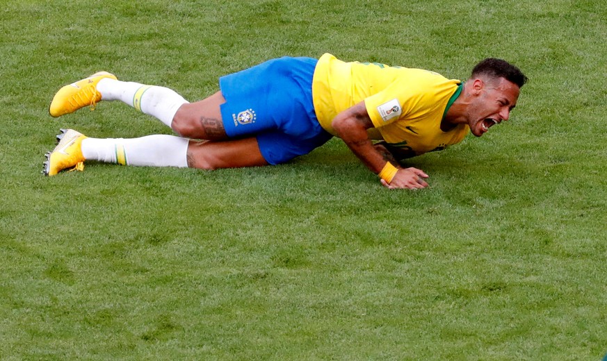 FILE PHOTO: World Cup - Round of 16 - Brazil vs Mexico - Samara Arena, Samara, Russia - July 2, 2018 Brazil&#039;s Neymar lies on the pitch after sustaining an injury REUTERS/David Gray/File Photo
