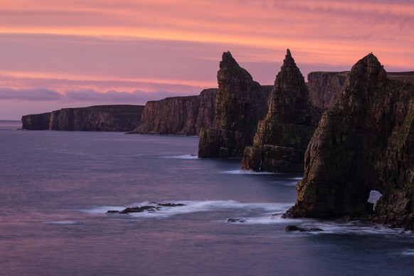 Colorful sunrise over Duncansby stacks, Duncansby head, Scotland John o Groats