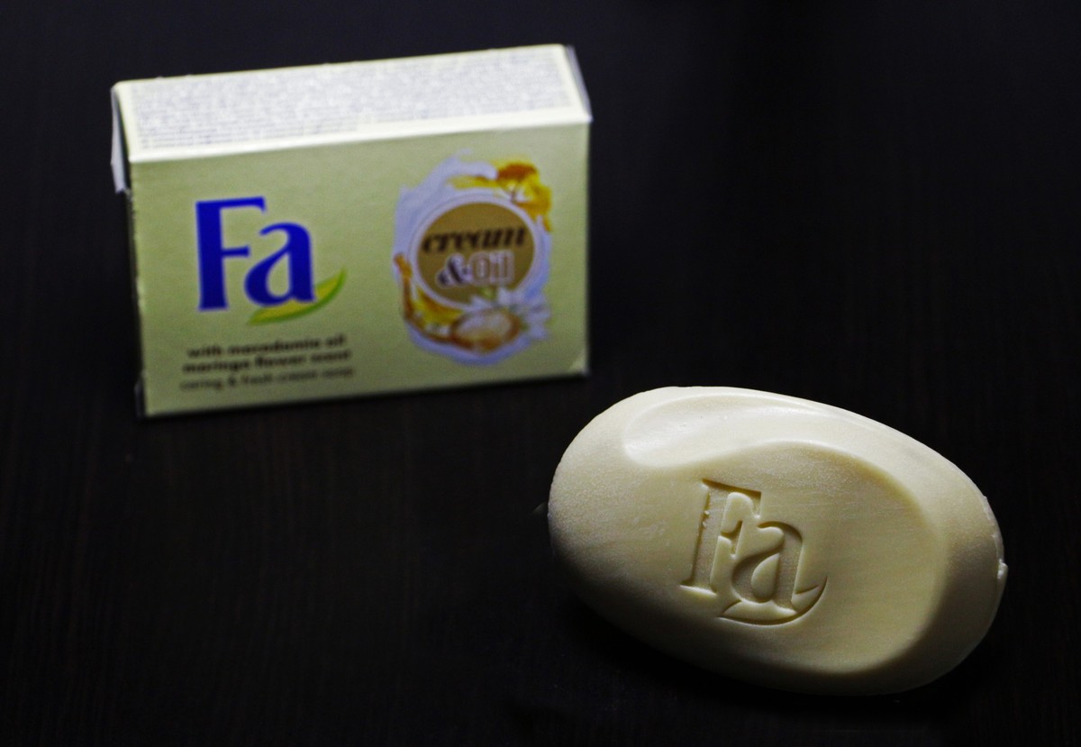 Fa cream and oil soap on dark black background., Fa cream and oil hand soap, for personal care and hygiene, isolated on dark background. Photo taken on 25.01.2020 in Romania.