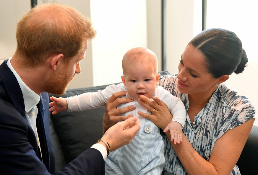 Britain s Prince Harry and Meghan visit South Africa Britain s Prince Harry and his wife Meghan, Duchess of Sussex, holding their son Archie, meet Archbishop Desmond Tutu not pictured at the Desmond & ...