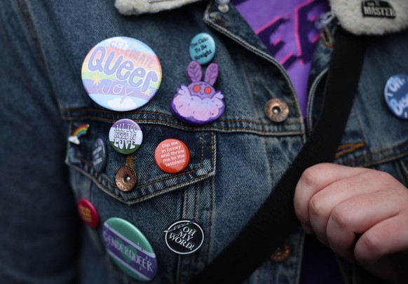OXFORD, ENGLAND - MAY 30: Badges are seen on a protester outside The Oxford Union on May 30, 2023 in Oxford, England.Dr.Kathleen Stock is a philosopher, writer and former professor. She has spoken aga ...