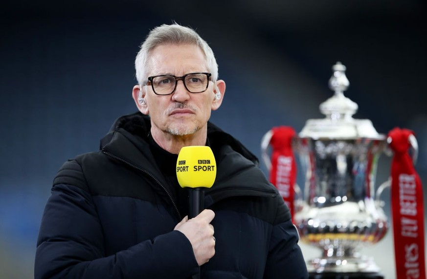 LEICESTER, ENGLAND - MARCH 21: Gary Lineker, BBC Sport TV Pundit looks on whilst standing next to the FA Cup trophy prior to the Emirates FA Cup Quarter Final match between Leicester City and Manchest ...