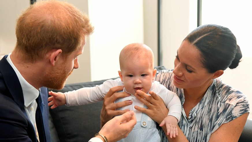 Britain s Prince Harry and Meghan visit South Africa Britain s Prince Harry and his wife Meghan, Duchess of Sussex, holding their son Archie, meet Archbishop Desmond Tutu not pictured at the Desmond & ...