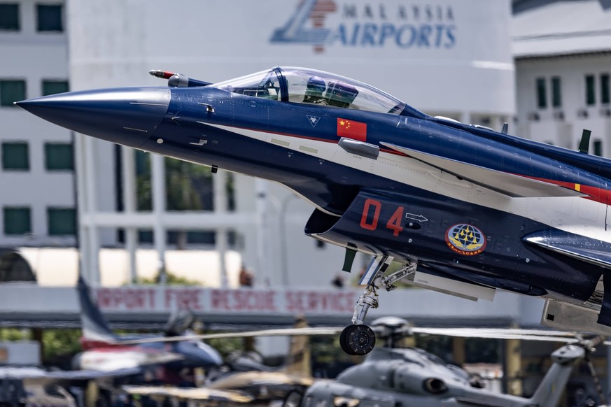 LANGKAWI, MALAYSIA - MAY 20: The Chinese People s Liberation Army PLA Air Force s August 1st aerobatics team attends a training ahead of the 16th Langkawi International Maritime and Aerospace Exhibiti ...