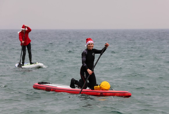 PXL_New Year s ride on a SUP board A group of Opatija residents rowed on SUPs to the Slatina beach in Opatija, Croatia on January 1, 2023. GoranxKovacic/PIXSELL