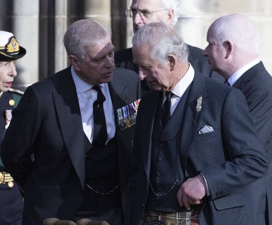 . 12/09/2022. Edinburgh, United Kingdom. King Charles III talks to his brother Prince Andrew as they leave a vigil at St.Giles Cathedral in Edinburgh where the coffin of Queen Elizabeth II lies at res ...