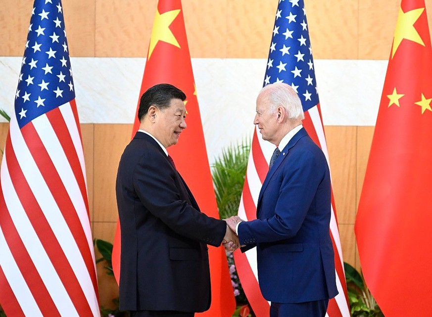 US President Joe Biden R and China s President Xi Jinping L shake hands as they meet on the sidelines of the G20 Summit in Nusa Dua on the Indonesian resort island of Bali on Monday on November 14, 20 ...