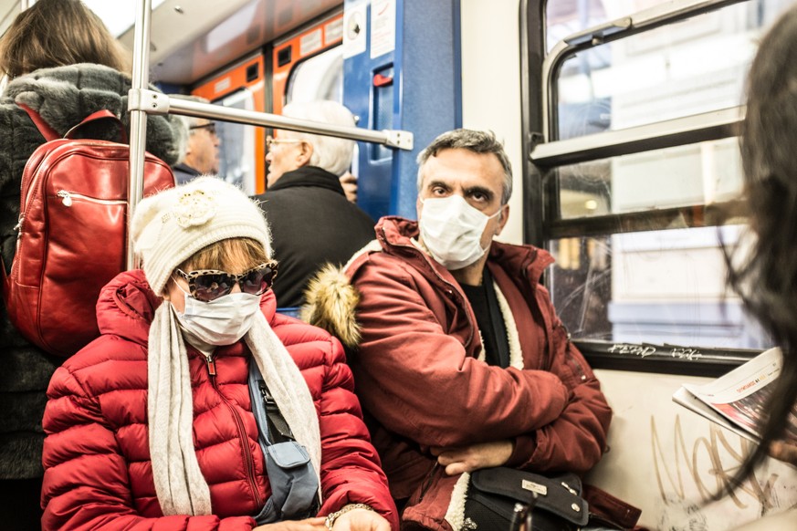 Athens, Greece - February 18, 2019: The H1N1 virus, known as swine flu, has killed 56 people in Greece. In February of 2019, 18 people in intensive care units died due to H1N1 virus. People protect th ...