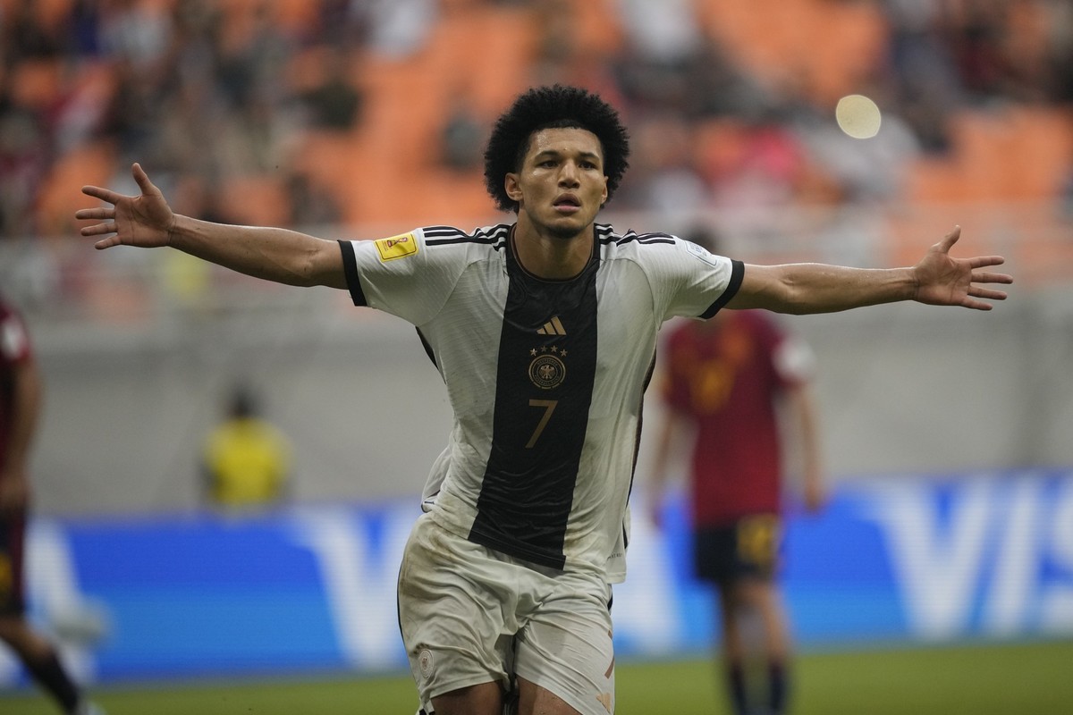Germany's Paris Brunner celebrates after scoring a goal from a penalty kick during the FIFA U-17 World Cup quarterfinal soccer match between Germany and Spain at Jakarta international Stadium in ...