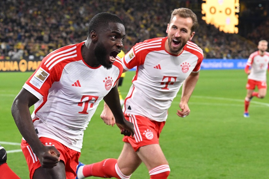 DORTMUND - Dayot Upamecano of FC Bayern Munchen and Harry Kane of FC Bayern Munchen celebrate the goal of Dayot Upamecano of FC Bayern Munchen during the Bundesliga match between Borussia Dortmund and ...