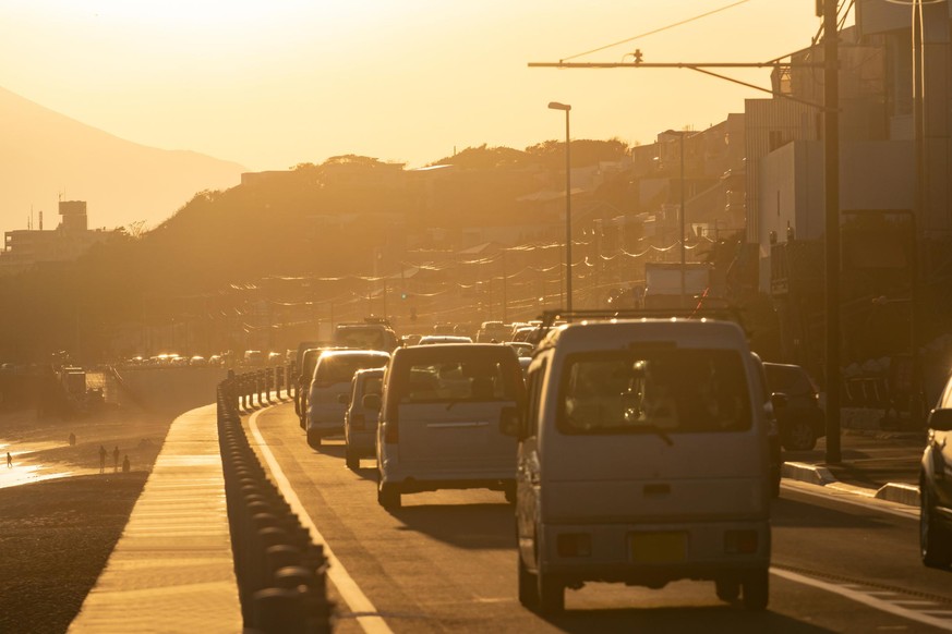 The sea is Sagami Bay, Pacific Ocean and the coast road is Route 134, Shonan Coast Road, Shichirigahama of Kamakura city, Kanagawa prefecture.