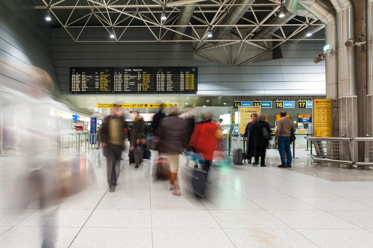 LISBON, PORTUGAL - JANUARY 6, 2014: People walking inside Lisbon airport