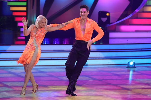 COLOGNE, GERMANY - MARCH 04: Michelle and Christian Polanc perform on stage during the 2nd show of the 15th season of the television competition show &quot;Let&#039;s Dance&quot; at MMC Studios on Mar ...