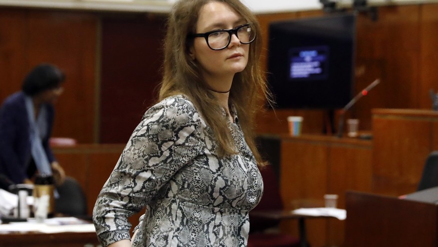 Anna Sorokin leaves during the lunch break at her trial in New York State Supreme Court, in New York, Monday, April 22, 2019. Sorokin, who claimed to be a German heiress, is on trial on grand larceny  ...