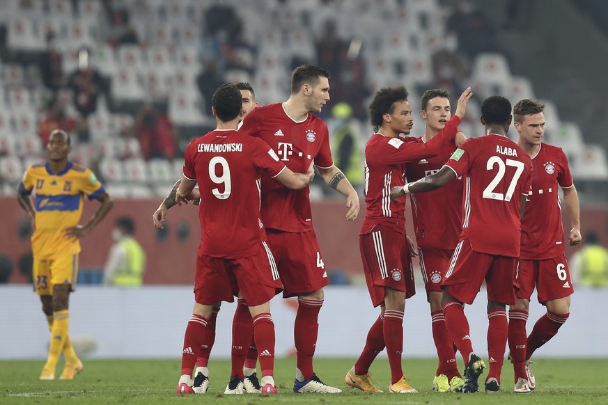 Bayern&#039;s Benjamin Pavard, third right, celebrates with his teammates after scoring his side&#039;s opening goal during the Club World Cup final soccer match between FC Bayern Munich and Tigres at ...