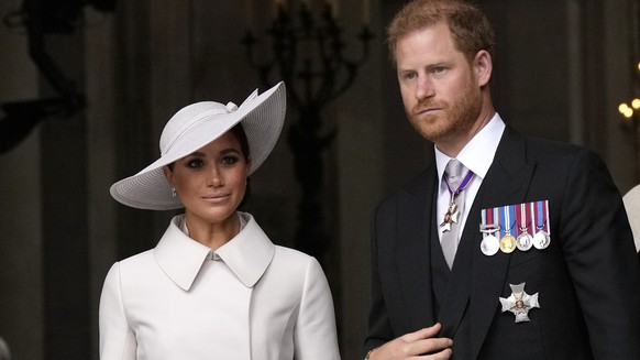 FILE - Prince Harry and Meghan Markle, Duke and Duchess of Sussex leave after a service of thanksgiving for the reign of Queen Elizabeth II at St Paul&#039;s Cathedral in London, Friday, June 3, 2022. ...
