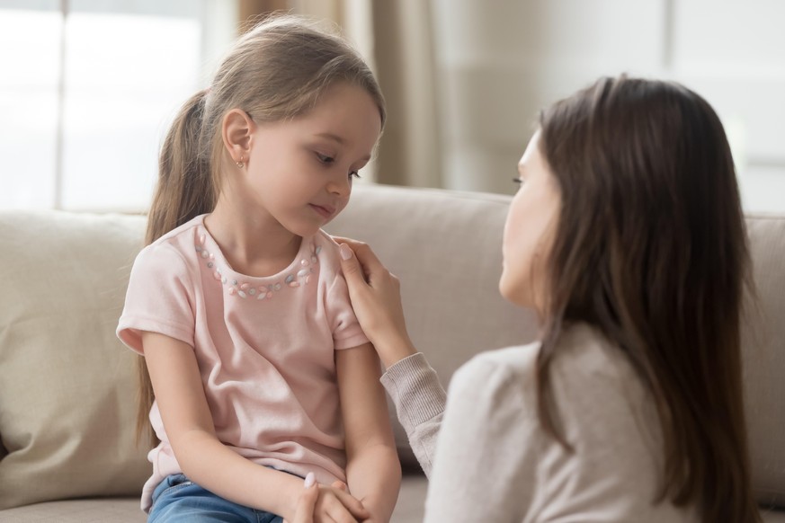 Loving worried mom psychologist consoling counseling talking to upset little child girl showing care give love support, single parent mother comforting sad small sullen kid daughter feeling offended