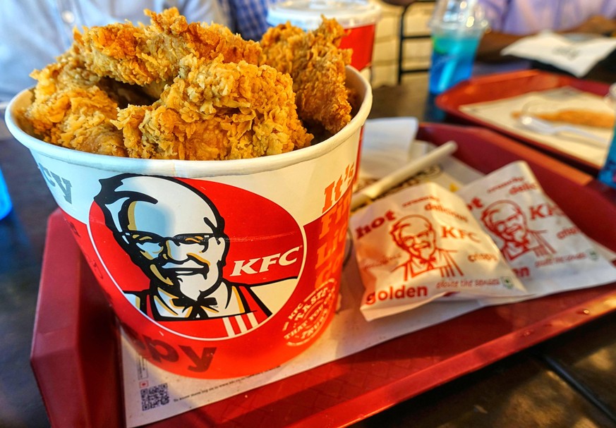 June 26, 2019 - Kolkata, West Bengal, India - KFC Bucket Chicken at an outlet in city centre shopping mall..KFC, also known as Kentucky Fried Chicken is an American Fast Food Company that provides del ...