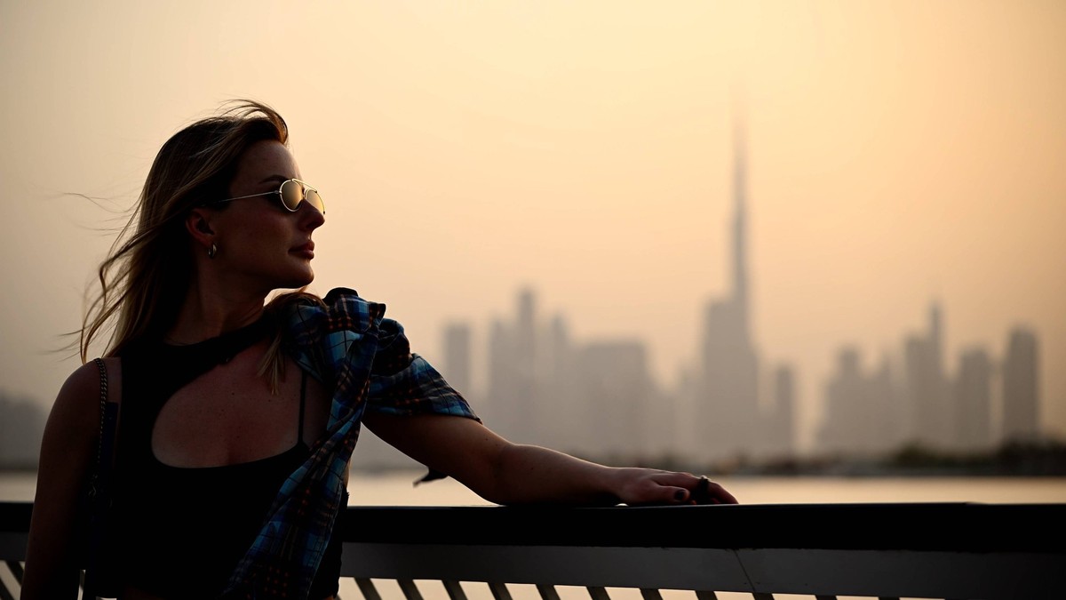 Captivating sunset view at Dubai Creek Harbour with the skyline of Dubai Business City and Burj Khalifa in the background A stunning sunset casts golden hues over Dubai Creek Harbour, showcasing the i ...