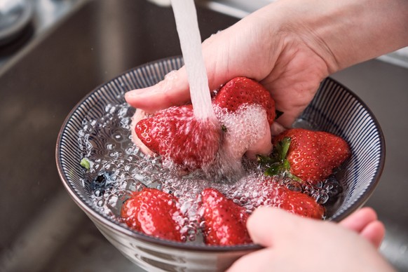 Wash and prepare strawberries