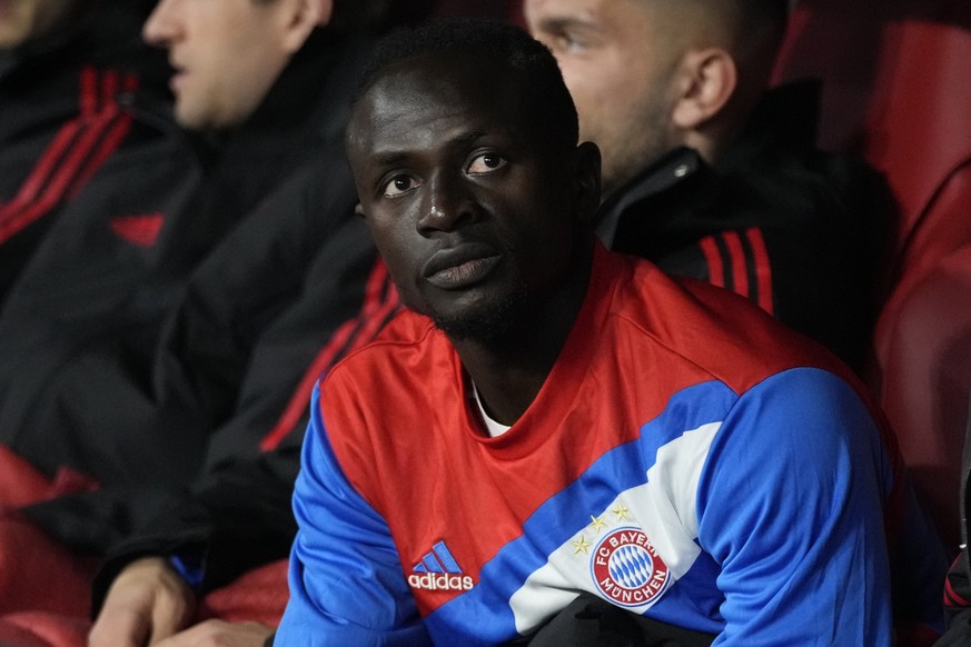 Bayern&#039;s Sadio Mane sits on the bench before the Champions League quarter final second leg soccer match between Bayern Munich and Manchester City, at the Allianz Arena stadium in Munich, Germany, ...