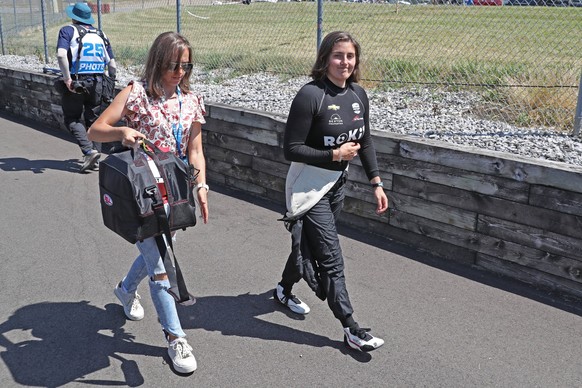 LEXINGTON, OH - JULY 02: NTT IndyCar, Indy Car, IRL, USA driver Tatiana Calderon walks through the pits with her sister Paula during qualifications at Mid Ohio on July 2, 2022 in Lexington, Ohio. Phot ...