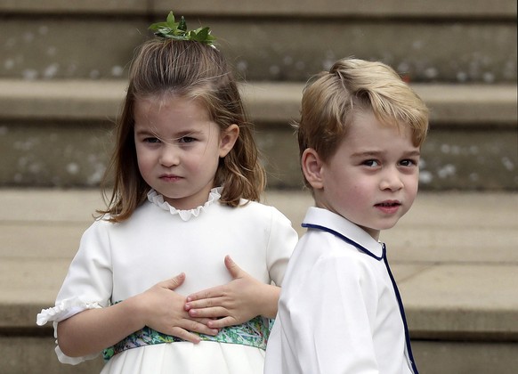 Prince George and Princess Charlotte arrive for the the wedding of Princess Eugenie of York and Jack Brooksbank at St George&#039;s Chapel, Windsor Castle, near London, England, Friday Oct. 12, 2018.  ...