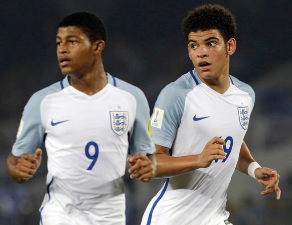 FILE - In this Wednesday, Oct. 25, 2017 file photo, England's Morgan Gibbs White, right, and Rhian Brewster follow the ball during the FIFA U-17 World Cup semifinal match against Brazil in Kolkata, In ...