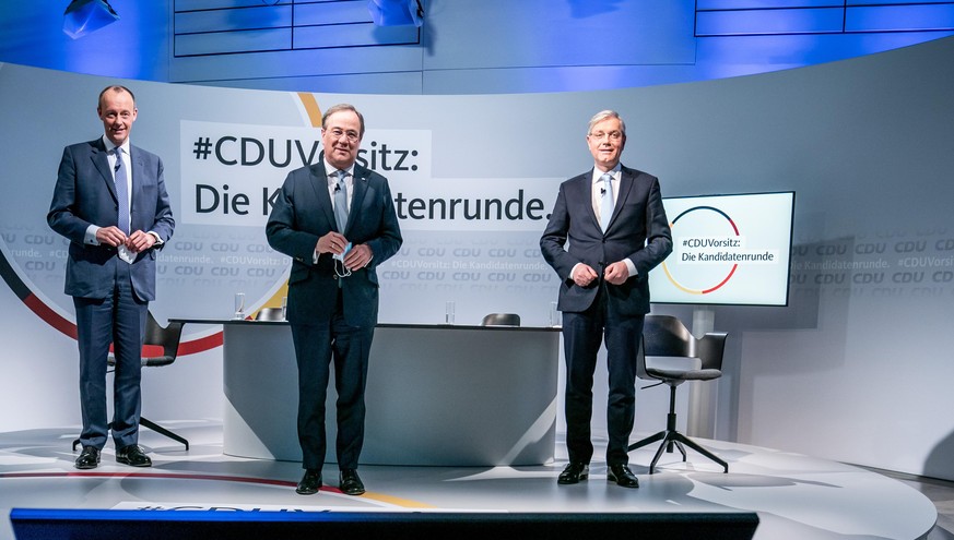 Die drei Kandidaten für den CDU-Parteivorsitz Friedrich Merz (l-r), Armin Laschet und Norbert Röttgen stehen nach einer Diskussionsrunde im Konrad-Adenauer-Haus. Vor der Wahl des CDU-Bundesvorsitzende ...