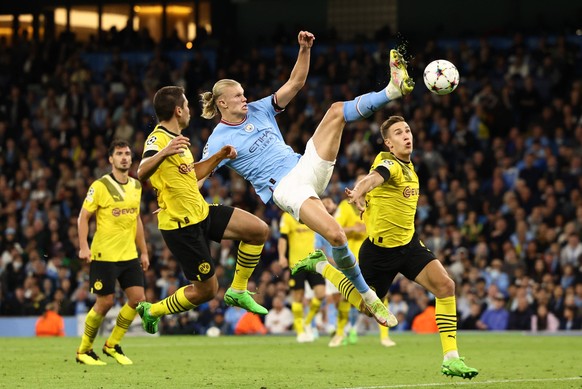 Manchester, England, 14th September 2022. Erling Haaland of Manchester City leaps up to score their second goal during the UEFA Champions League match at the Etihad Stadium, Manchester. Picture credit ...